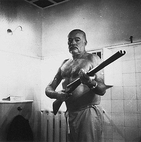 Ernest-Hemingway-with-a-rifle